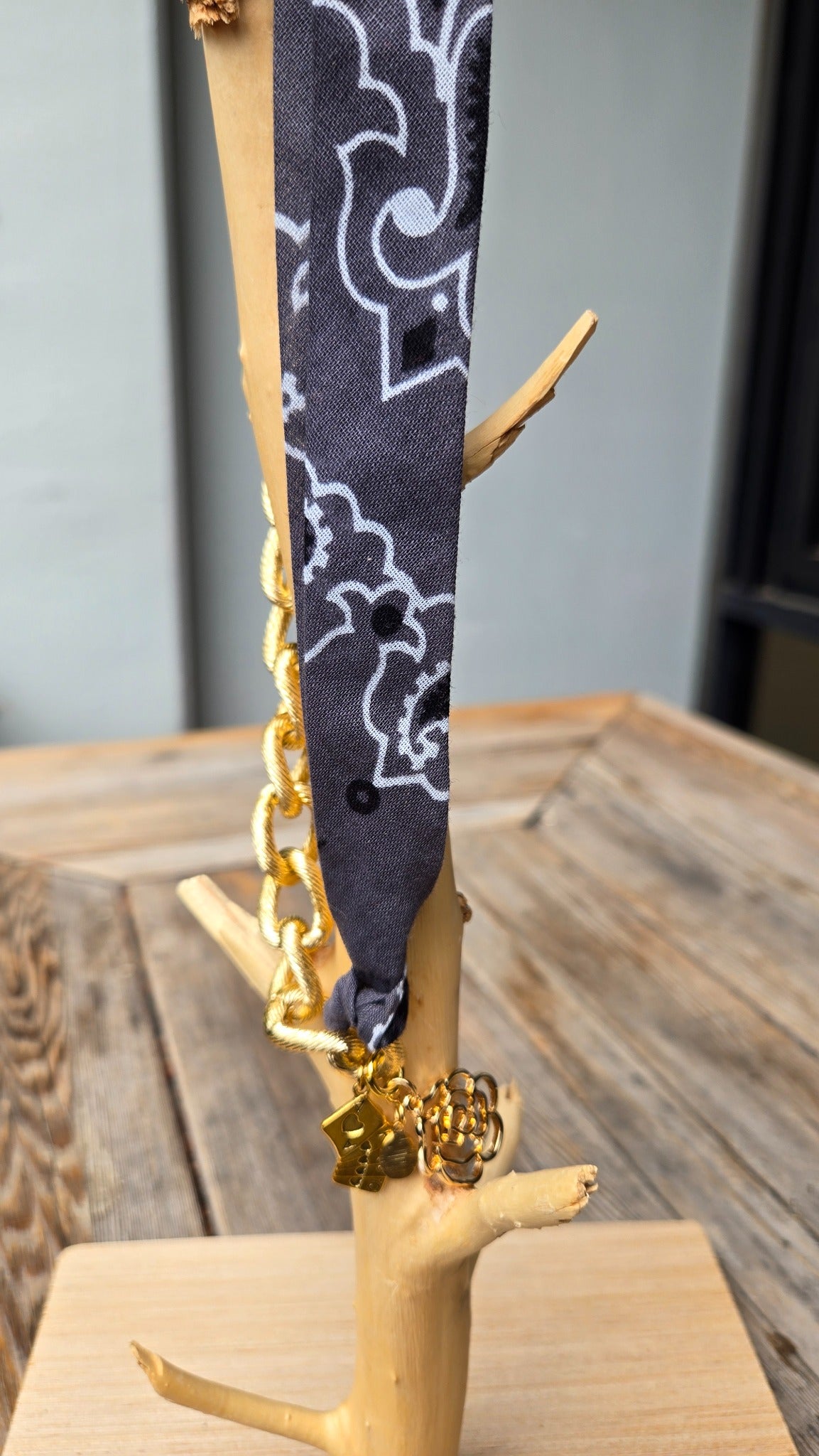 Black bandana gold chain charm necklace with dice and rose charms