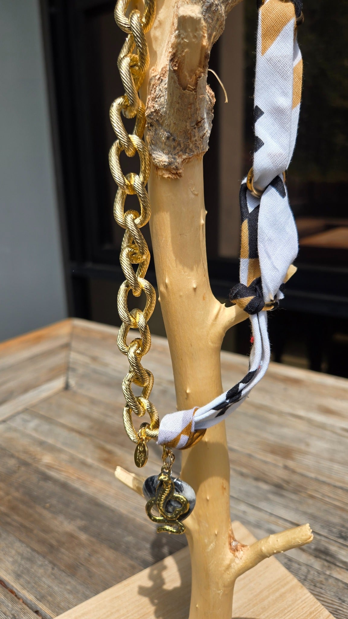 Black and white scarf gold chain necklace with decorative charm