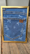 Denim pocket gold frame Cutie display