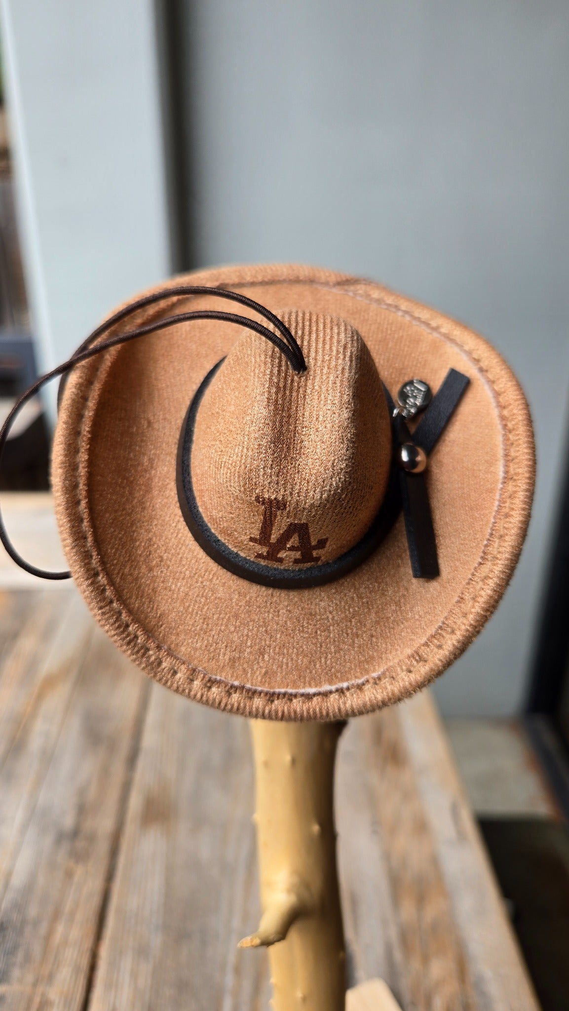 Tan mini western hat top with dark decorative band