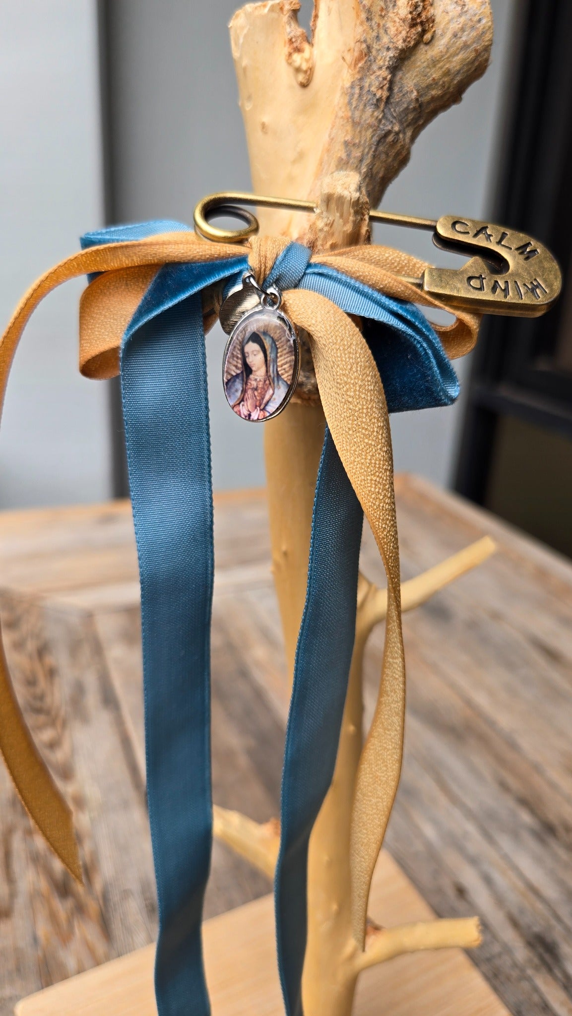 Teal and gold ribbon accessory charm with medallion